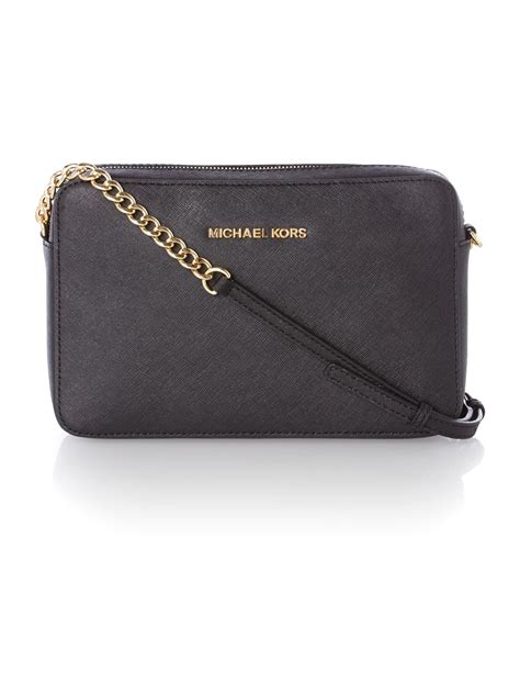 michael kors jet set travel small black cross body bag|Michael Kors studded crossbody bag.